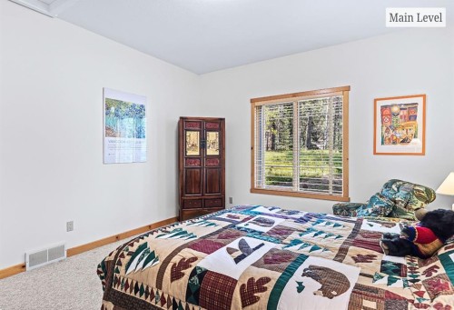 18 Juniper Ridge, Canmore, AB - Indoor Photo Showing Bedroom