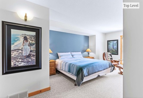 18 Juniper Ridge, Canmore, AB - Indoor Photo Showing Bedroom