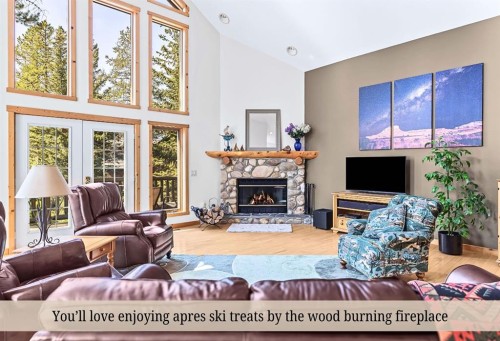 18 Juniper Ridge, Canmore, AB - Indoor Photo Showing Living Room With Fireplace