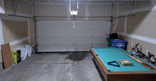 231 Windford Crescent Sw, Airdrie, AB - Indoor Photo Showing Garage