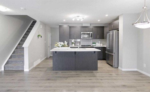 231 Windford Crescent Sw, Airdrie, AB - Indoor Photo Showing Kitchen With Stainless Steel Kitchen With Upgraded Kitchen