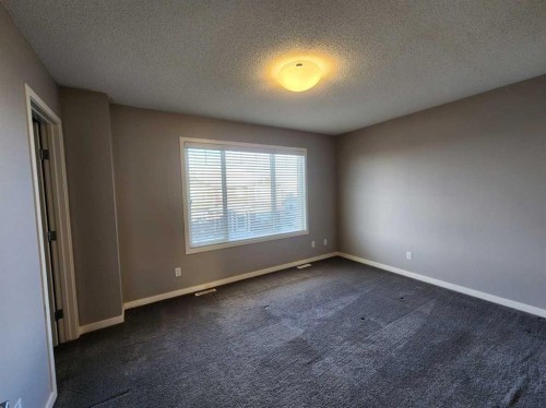 217 Panatella Walk Nw, Calgary, AB - Indoor Photo Showing Other Room
