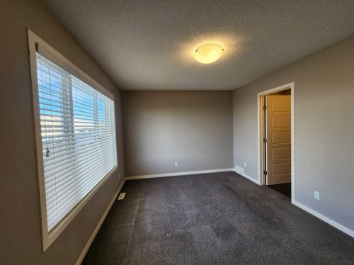217 Panatella Walk Nw, Calgary, AB - Indoor Photo Showing Other Room
