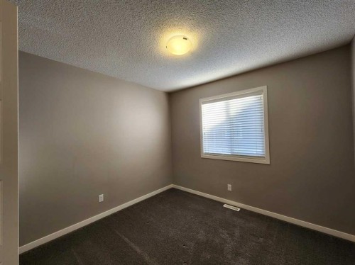217 Panatella Walk Nw, Calgary, AB - Indoor Photo Showing Other Room