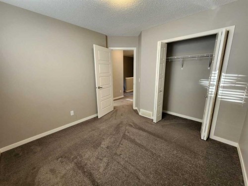217 Panatella Walk Nw, Calgary, AB - Indoor Photo Showing Other Room
