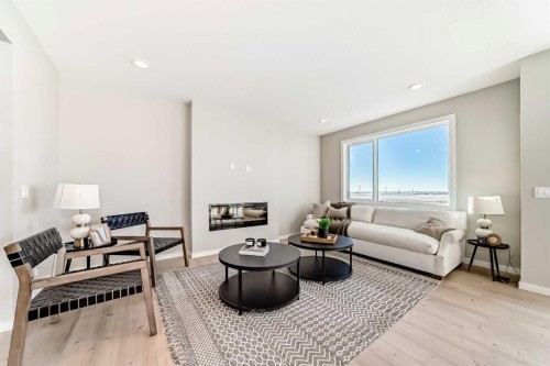 58 Walgrove Bay Se, Calgary, AB - Indoor Photo Showing Living Room With Fireplace