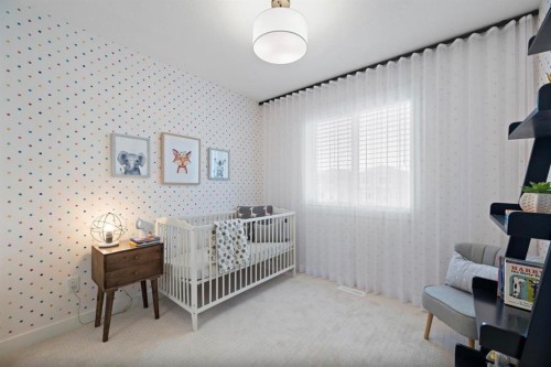 552 Lewisburg Place Ne, Calgary, AB - Indoor Photo Showing Bedroom