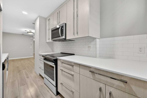 128 Corner Meadows Gate Ne, Calgary, AB - Indoor Photo Showing Kitchen With Upgraded Kitchen
