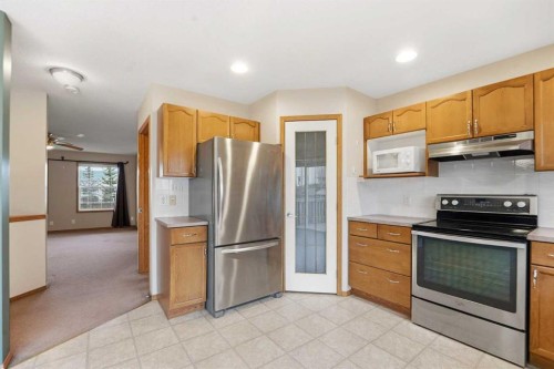 905 Arbour Lake Road Nw, Calgary, AB - Indoor Photo Showing Kitchen With Stainless Steel Kitchen