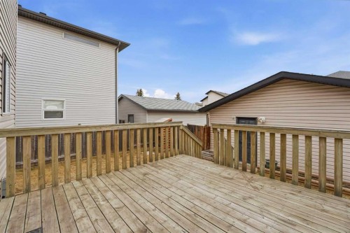 905 Arbour Lake Road Nw, Calgary, AB - Outdoor With Deck Patio Veranda With Exterior