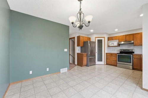 905 Arbour Lake Road Nw, Calgary, AB - Indoor Photo Showing Kitchen