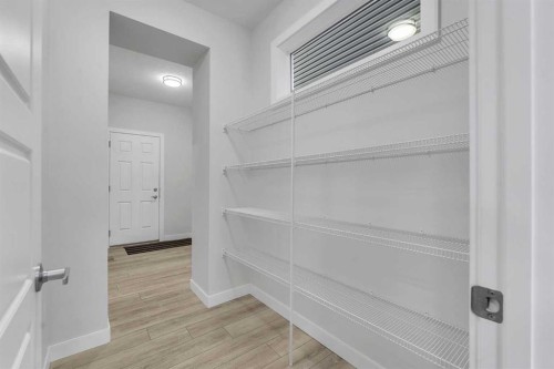 15 Midgrove Drive Sw, Airdrie, AB - Indoor With Storage