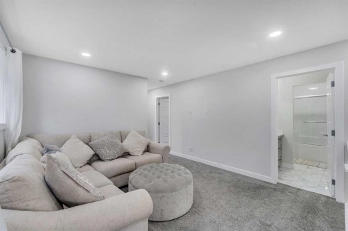 15 Midgrove Drive Sw, Airdrie, AB - Indoor Photo Showing Basement