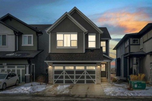 15 Midgrove Drive Sw, Airdrie, AB - Outdoor With Facade