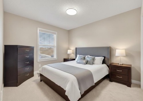 91 Kinlea Link Nw, Calgary, AB - Indoor Photo Showing Bedroom