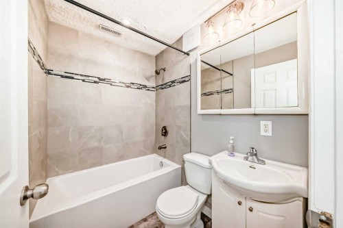 3613 28A Avenue Se, Calgary, AB - Indoor Photo Showing Bathroom