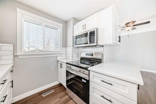 3613 28A Avenue Se, Calgary, AB - Indoor Photo Showing Kitchen