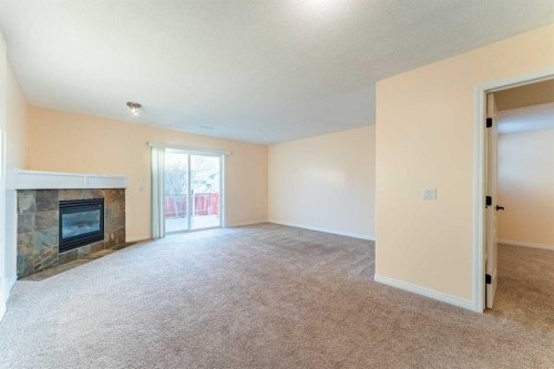 224 Highland Circle, Strathmore, AB - Indoor With Fireplace