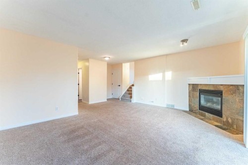 224 Highland Circle, Strathmore, AB - Indoor With Fireplace