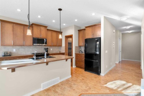 5 Mahogany Square Se, Calgary, AB - Indoor Photo Showing Kitchen With Double Sink