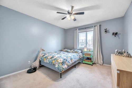 249 Mt.Douglas Circle Se, Calgary, AB - Indoor Photo Showing Bedroom