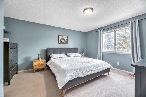 249 Mt.Douglas Circle Se, Calgary, AB - Indoor Photo Showing Bedroom