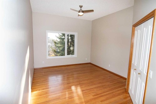 16 Eagleview Heights Nw, Cochrane, AB - Indoor Photo Showing Other Room