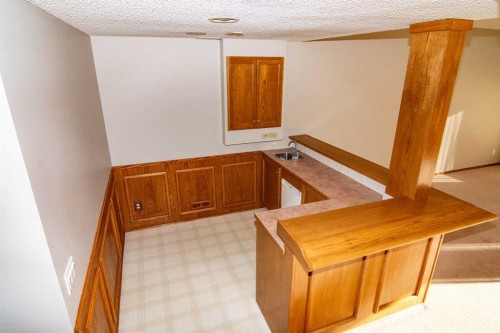 16 Eagleview Heights Nw, Cochrane, AB - Indoor Photo Showing Other Room