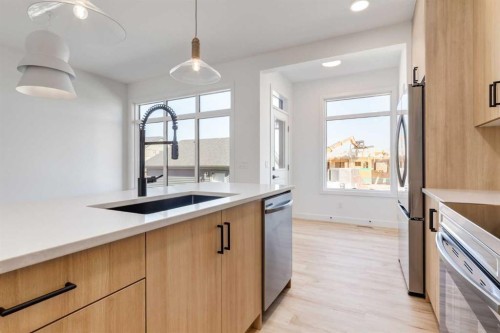 203 Tillotson Drive, Okotoks, AB - Indoor Photo Showing Kitchen