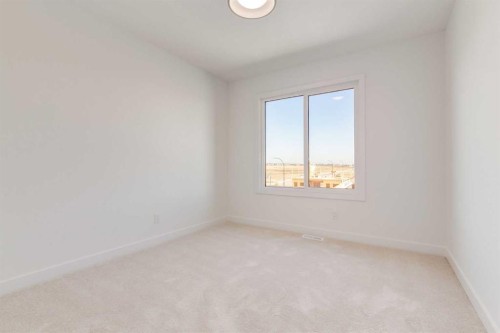 203 Tillotson Drive, Okotoks, AB - Indoor Photo Showing Other Room