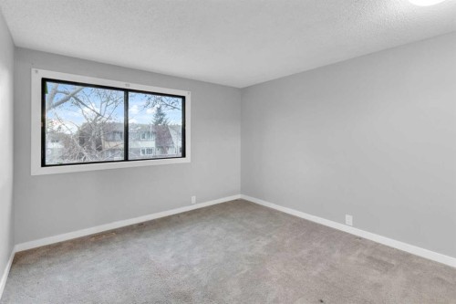1418 Ranchlands Road Nw, Calgary, AB - Indoor Photo Showing Other Room