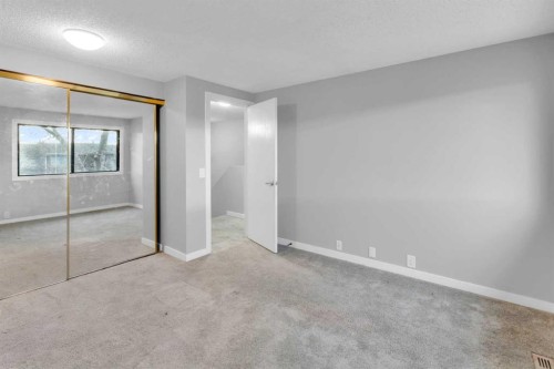 1418 Ranchlands Road Nw, Calgary, AB - Indoor Photo Showing Other Room