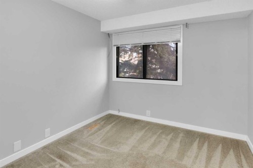 1418 Ranchlands Road Nw, Calgary, AB - Indoor Photo Showing Other Room