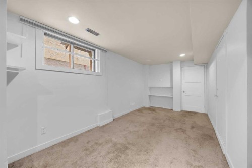 49 Beacham Way Nw, Calgary, AB - Indoor Photo Showing Other Room