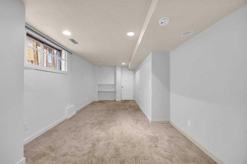 49 Beacham Way Nw, Calgary, AB - Indoor Photo Showing Other Room