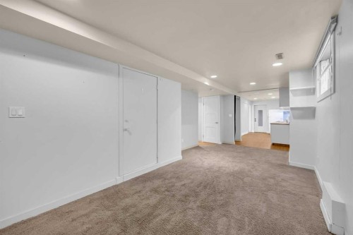 49 Beacham Way Nw, Calgary, AB - Indoor Photo Showing Other Room