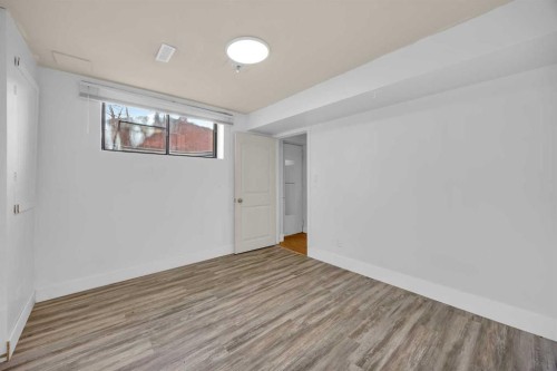 49 Beacham Way Nw, Calgary, AB - Indoor Photo Showing Other Room
