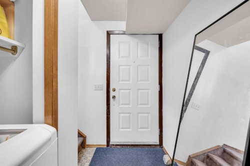 49 Beacham Way Nw, Calgary, AB - Indoor Photo Showing Other Room