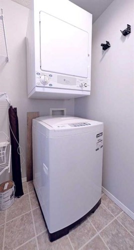 1204-2371 Eversyde Avenue Sw, Calgary, AB - Indoor Photo Showing Laundry Room