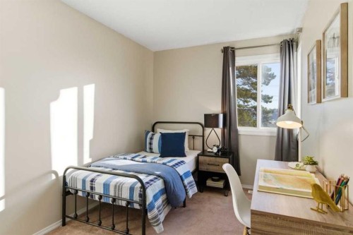 6-99 Grier Place Ne, Calgary, AB - Indoor Photo Showing Bedroom