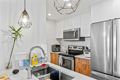 110 Savanna Walk Ne, Calgary, AB - Indoor Photo Showing Kitchen With Stainless Steel Kitchen With Upgraded Kitchen