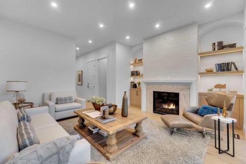 1729 19 Avenue Nw, Calgary, AB - Indoor Photo Showing Living Room With Fireplace