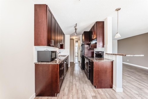 302-4455A Greenview Drive Ne, Calgary, AB - Indoor Photo Showing Kitchen
