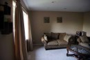 1908 Olympia Drive Se, Calgary, AB  - Indoor Photo Showing Living Room 