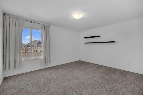 85 Reynolds Road, Sylvan Lake, AB - Indoor Photo Showing Other Room