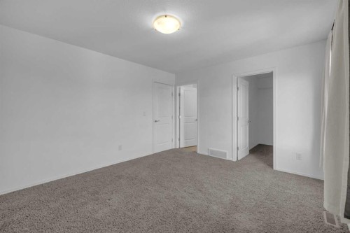 85 Reynolds Road, Sylvan Lake, AB - Indoor Photo Showing Other Room