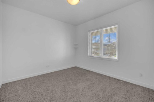 85 Reynolds Road, Sylvan Lake, AB - Indoor Photo Showing Other Room