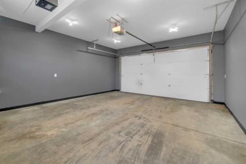 85 Reynolds Road, Sylvan Lake, AB - Indoor Photo Showing Garage