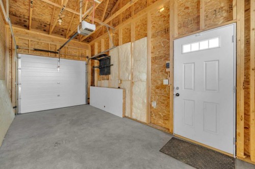 85 Reynolds Road, Sylvan Lake, AB - Indoor Photo Showing Garage