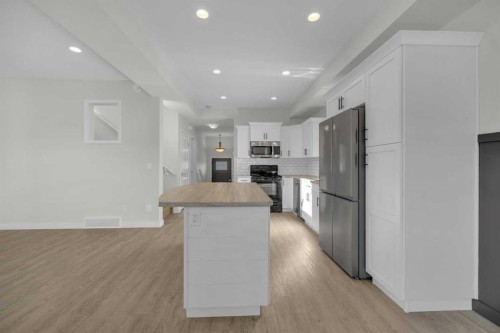 85 Reynolds Road, Sylvan Lake, AB - Indoor Photo Showing Kitchen